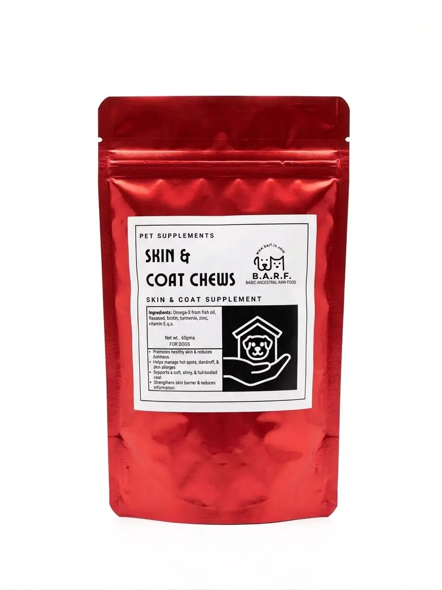 A shiny red resealable pouch labeled “Skin & Coat Supplements for Dogs – BARF India Chews” from www.barfindia.com features a black and white sticker with product details, ingredients, and a small cartoon dog in a house icon.