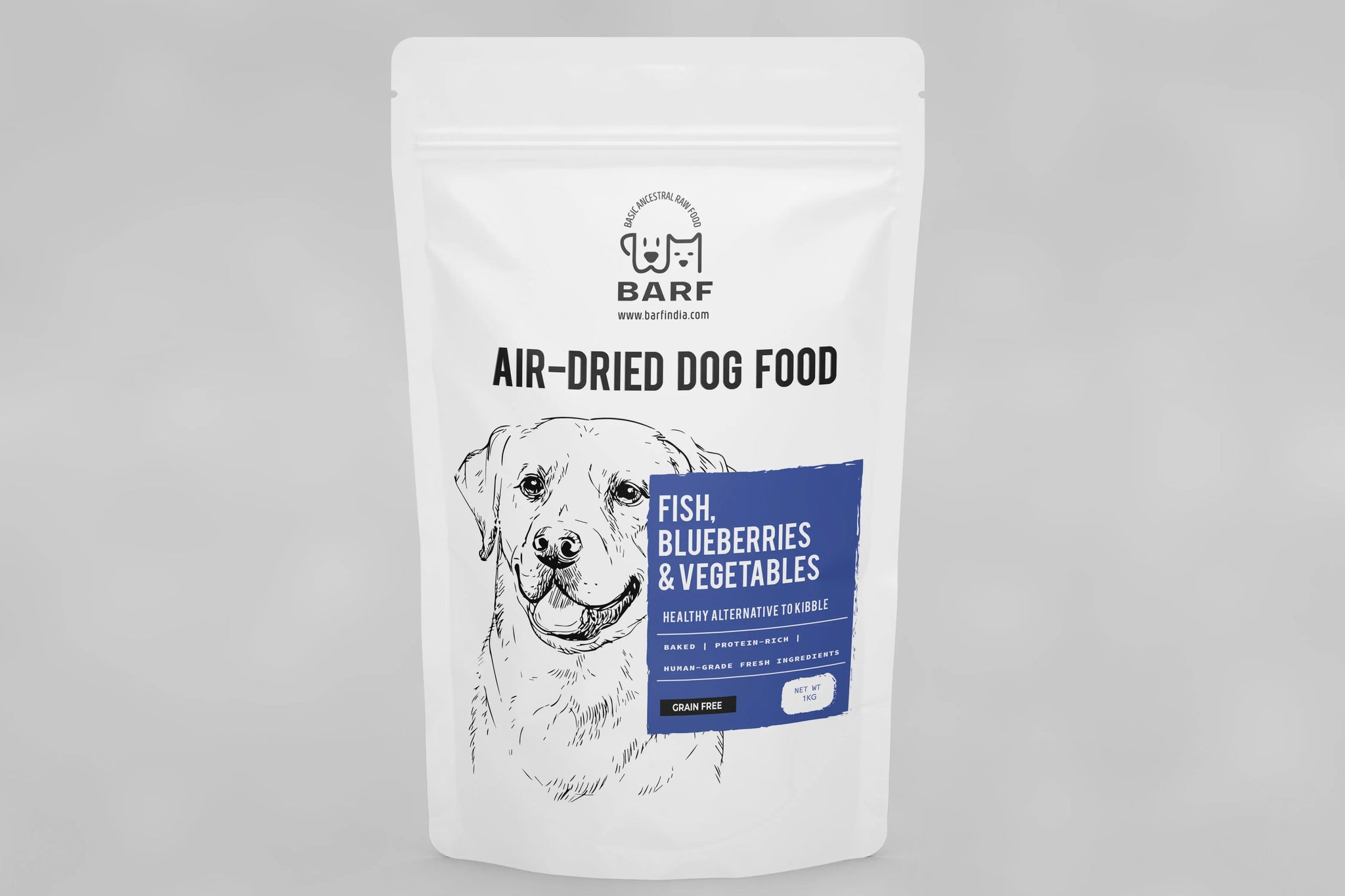 A white bag of www.barfindia.com Air Dried Dog Food - Fish Recipe with a black dog drawing; the label highlights fish, blueberries & vegetables flavor, grain-free, healthy, omega-3 rich, and suitable for all breeds.