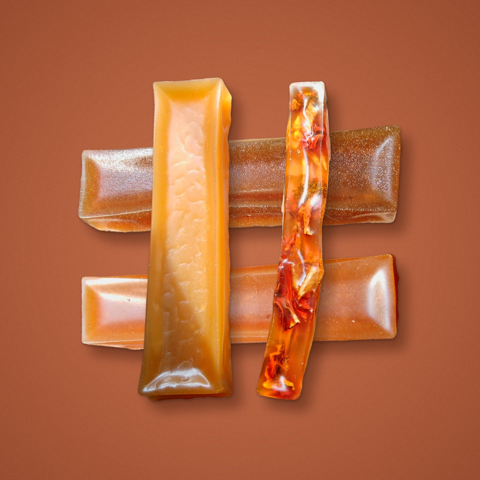 Grid of four bone broth dog chews, each on its own coloured background: teal, blush, sage and peach. BARF INDIA