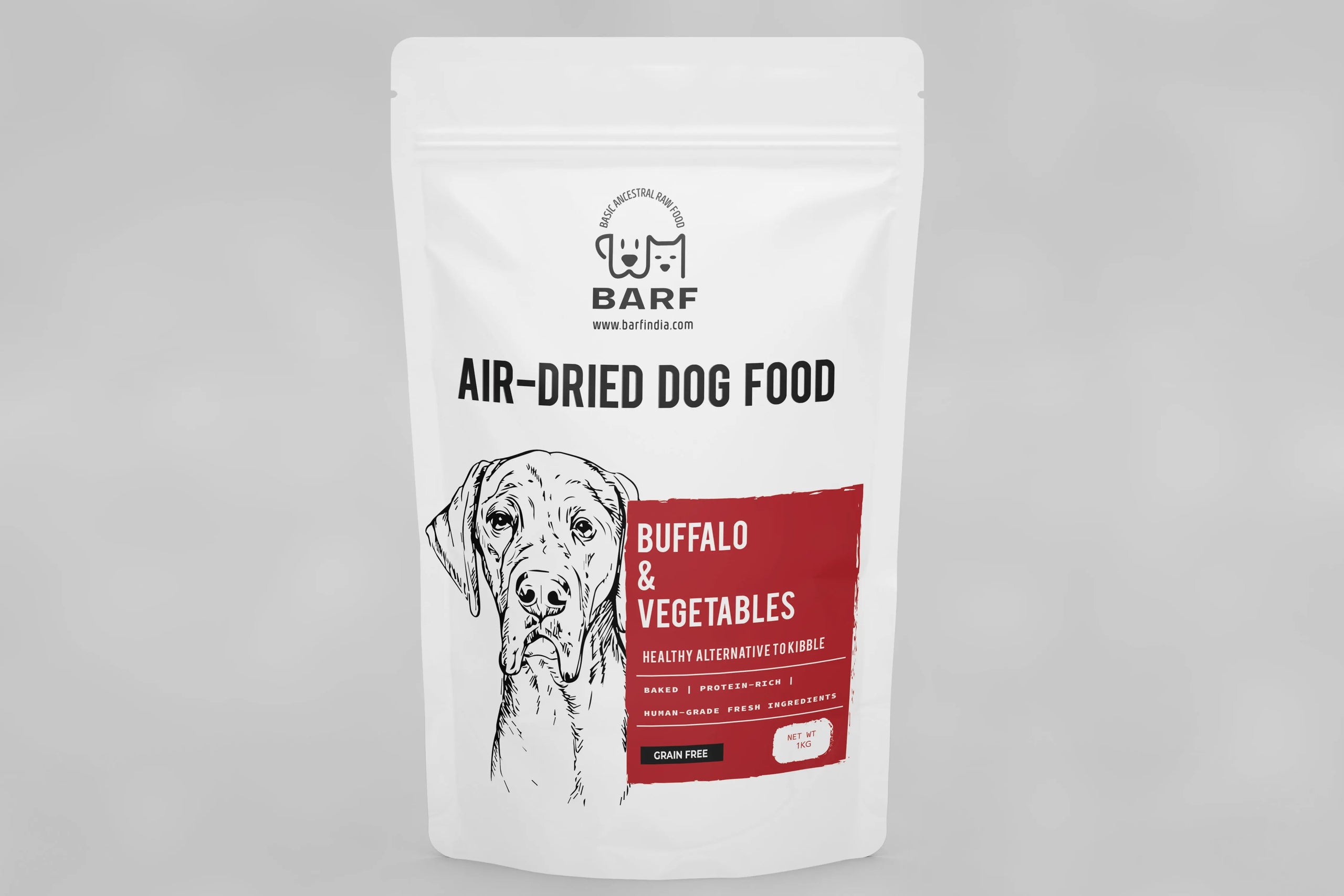 A white resealable bag of www.barfindia.com Air Dried Dog Food - Buffalo Recipe features a black dog sketch and red accents, offering a high-protein, grain-free meal with buffalo and vegetables for a healthy alternative.