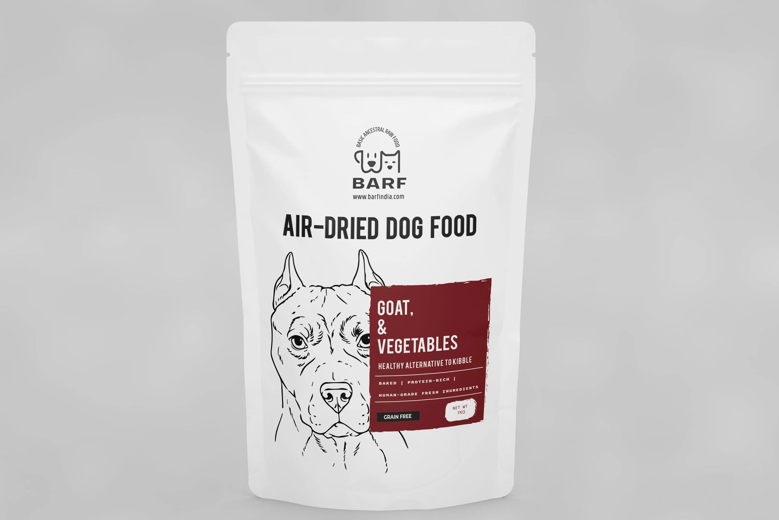 A white pack labeled www.barfindia.com Air-Dried Dog Food – Goat and Vegetables shows a black line dog face. This grain-free, high-protein, pasture-raised goat and veggie recipe offers a healthy alternative for dogs.