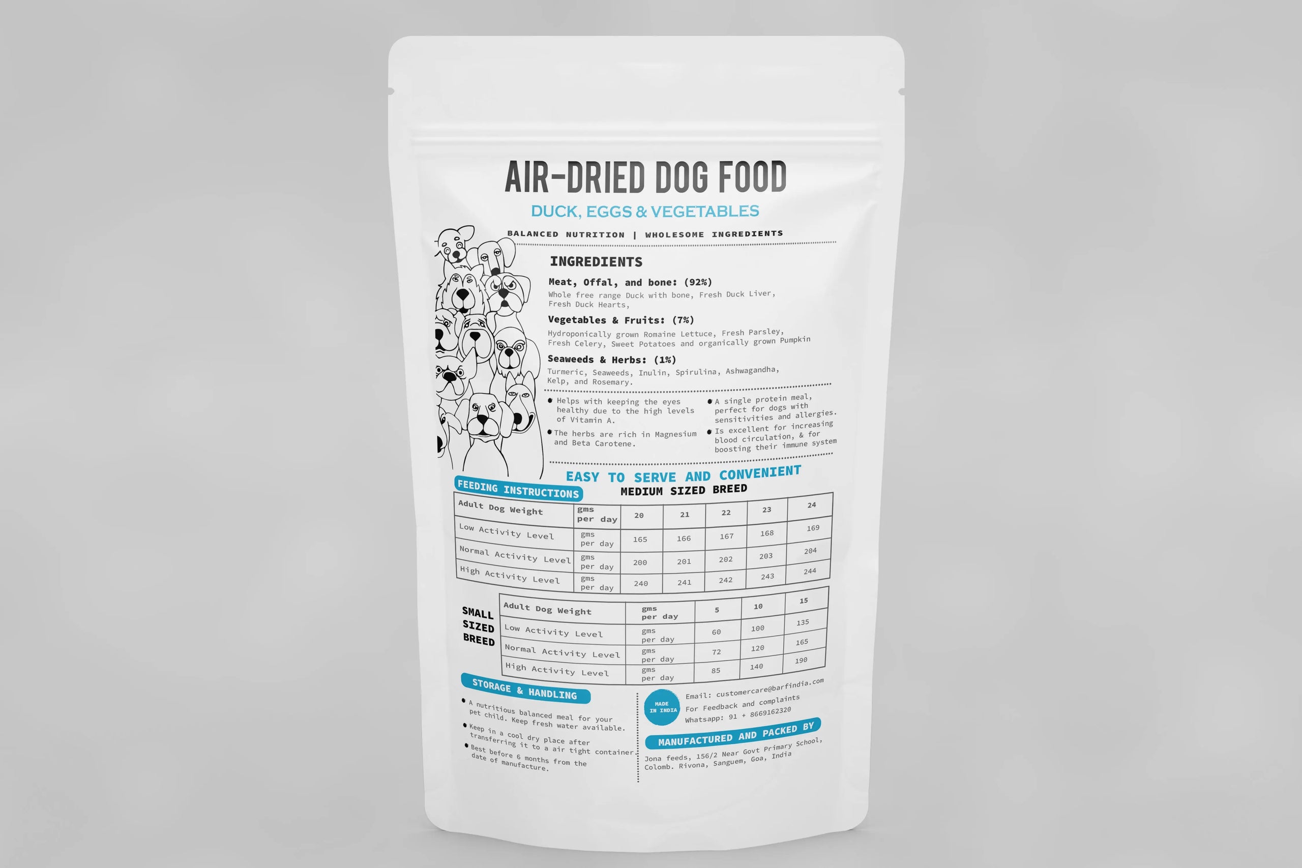 A white pouch of www.barfindia.com Air Dried Dog Food - Duck Recipe, with eggs and vegetables, stands upright on a gray background. The packaging shows cartoon dogs, key ingredients, feeding instructions, and promotes its single protein formula.